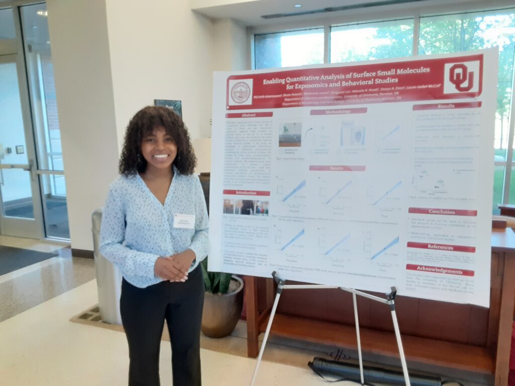 Mitchelle presenting her poster